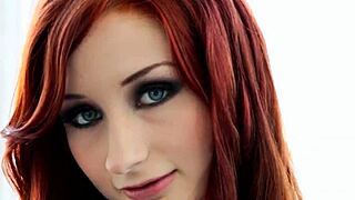 Redhead uses strapon to fuck ass in lesbian scene