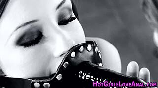 Redhead uses strapon to fuck ass in lesbian scene