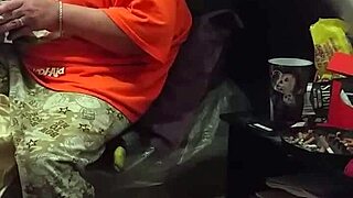 My stepmom is acting like she's not looking at the big black cock flashing.