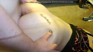 girlfriend gets down in front of the desk, showing her ass