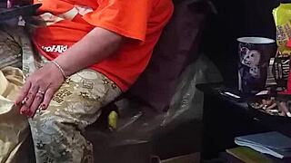 My stepmom is acting like she's not looking at the big black cock flashing.