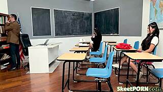 teacher interacts with asian students during school hours