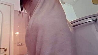 hot blonde got naked in the bathroom, masturbating her pussy