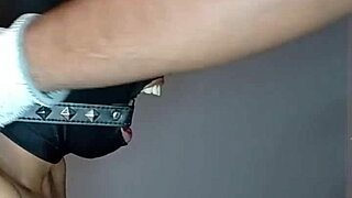 practicing deep throat with ring gag in homemade setting