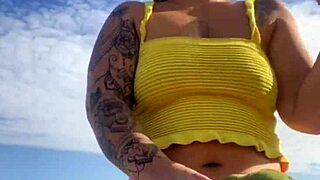 Bikini Splits Swollen Pussy on Beach