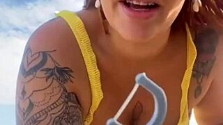 Bikini Splits Swollen Pussy on Beach