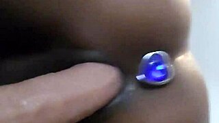 mature latina teases with dildo on bed