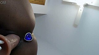 mature latina teases with dildo on bed