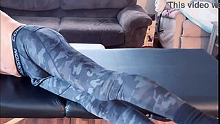 skinny girl stretches in compression pants on massage table