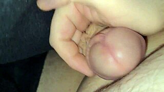 Chubbykaot lies in bed watching porn, her curvy belly exposed as she masturbates solo.