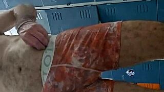 guy jerks off his big cock in the gym bathroom