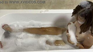 Brunette with small tits sings naked in the bath