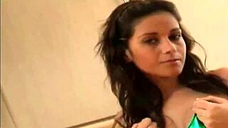 Cute Brunette In PVC Nurse Uniform Strips!