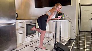 mommy with a big ass relaxes after the gym, stretching out her curves.