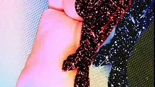 She sings the second version of 'I Am Bitch' with domination and fetish elements