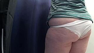 i watch the chubby milf's big ass in white panties trying on leggings in the fitting room