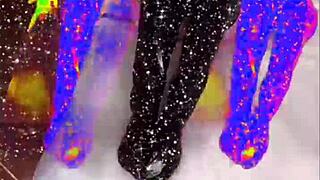 She sings the second version of 'I Am Bitch' with domination and fetish elements