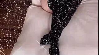 She sings the second version of 'I Am Bitch' with domination and fetish elements