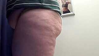 i watch the chubby milf's big ass in white panties trying on leggings in the fitting room