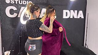 tattoo artist works on bodybuilder client in intriguing session