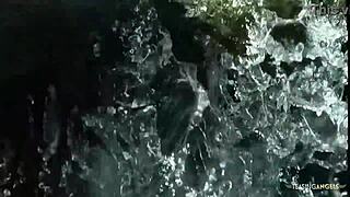 This lucky guy licked her pussy by the waterfall, so she gave him a handjob