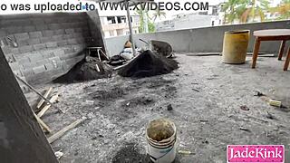 Horny couple fucks rough on construction site, choking and chaining.