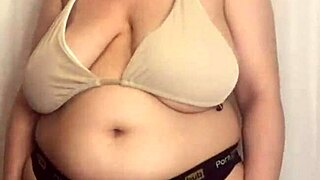 i'm trying on bikini bras, but they're too tight