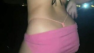 Sexy girl in micro panties on the beach