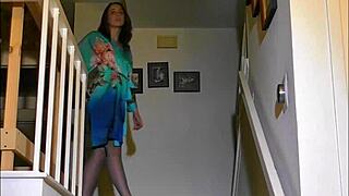 I admire Luna Lain's exotic striptease on the stairs, revealing her beautiful body.