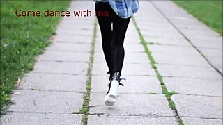 Sexy girl dancing in the street invites you to dance with aarina in park.