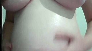 Blonde pregnant wife gets cream and massage