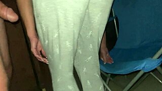 Amateur couple engages in public intimate activity