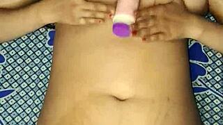 Look at this Indian bhabhi's wet pussy getting dildo fucked hard!