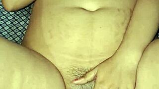 Look at this Indian bhabhi's wet pussy getting dildo fucked hard!