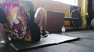 Alternative Girl Stretches At Gym.