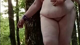 Slave Titia La Tertius chained and spanked in the forest