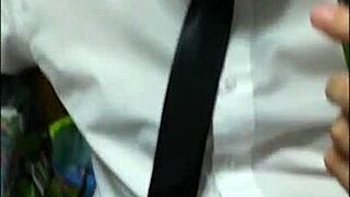 Watch this couple's blowjob ending in cum on tie