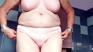 Old german granny fucks her hairy pussy with a cucumber intensely