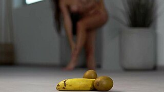 Petite girl crushes fruits with high heels fetish