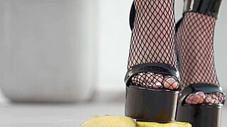 Petite girl crushes fruits with high heels fetish