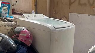 woman washes clothes with tits and pussy out
