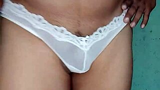 Getting excited in a white thong, dancing around in lingerie