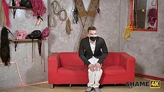 blonde mature with huge fake tits dominates and fucks pavlos in stockings.