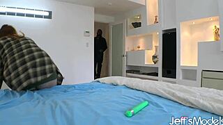 Curvy redhead Adora Bell contrasts her pale skin with a huge black cock in her mouth