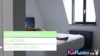 Beautiful Asian Li Moon strips in lingerie, revealing her petite body and big tits before posing naked