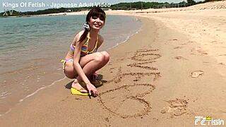 Skinny Japanese chick enjoys beach photoshoot close-ups