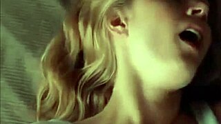 two women share a gentle kiss in this movie scene