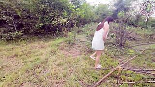 Thai Girl Walks and Helps Herself in the Forest