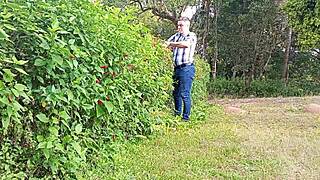 Gardener strokes massive cock to cum on farm