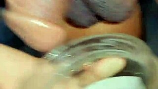 in this homemade video, a feminine sissy fingers her asshole while standing and pissing